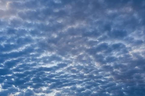 Amazing clouds in the sky before sunset Stock Photos