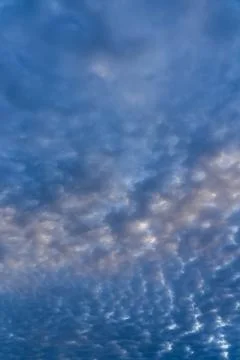 Amazing clouds in the sky before sunset Stock Photos