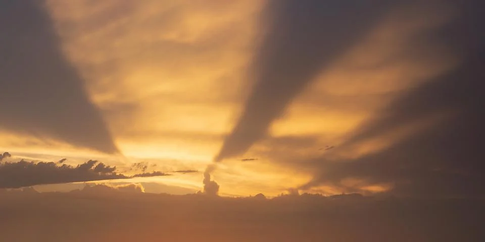 Amazing cloudscape with sun rays Stock Photos