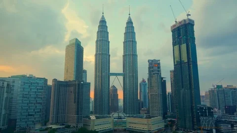 Amazing cloudscape timelapse with the Petronas Twin Towers in sunset time Stock Footage 81081171