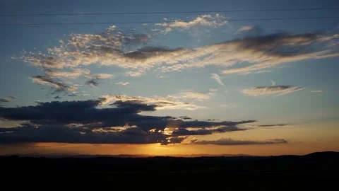Amazing cloudy orange sunset on blue evening sky, background 库存影片 124179545