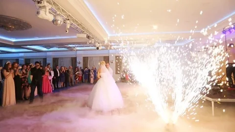 Amazing couple dancing on their wedding party in the elegant restaurant with a Stock Footage 73925459