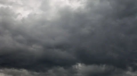 Amazing dramatic gloomy view of the oncoming low overhead dark clouds Stock Footage 39652271
