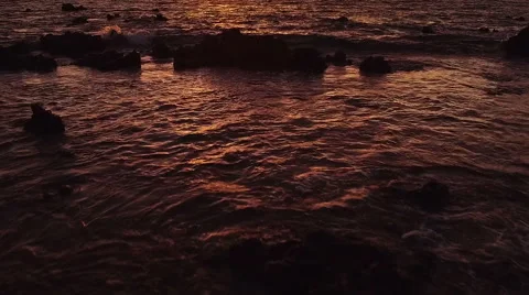 Amazing Dramatic Sunset View. Aerial Shot Flying Low into Horizon Over Water. Stock Footage 57058475