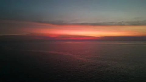 Amazing dramatic sunset view with sea and sun on the horizon Stock Footage 234980476