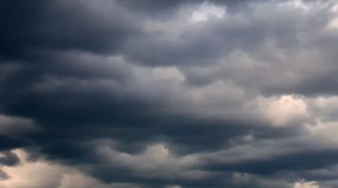 Amazing dramatic view of the leaving low dark clouds without any sunshine. Stock Footage 39652222