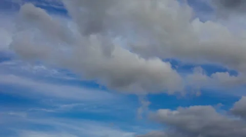 Amazing dramatic view of the white clouds on blue sky, making romantic emotions. Stock Footage 39659770