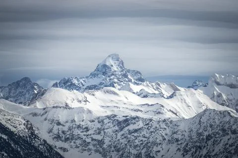 Amazing dramatic Winter View to the snow covered Mountain Hochvogel in Allgau Stock Photos