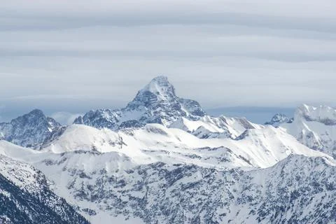 Amazing dramatic Winter View to the snow covered Mountain Hochvogel in Allgau Stock Photos