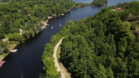 Amazing Drone Flight Down the Side of Lions Lookout (Fairy Lake - Muskoka -  Stock Footage 314233574