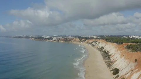 Amazing Drone Shot Of Wide Sandy Beach With Clouds On The Sky In Algarve Stock Footage 128832953