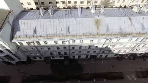 Amazing drone view of beige house facade with several windows on sunny day Stock Footage 107080296