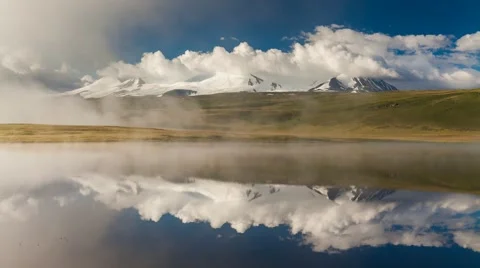 Amazing dynamic timelapse of mountain lake with fog Stock Footage 66255495
