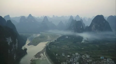 Amazing evening time-lapse scene of Mist moving famous mountains in China Stock Footage 64830182