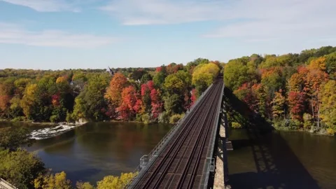 AMAZING Fall Swooping Shot of Train Track (Paris Ontario) - BEST Stock Footage 314202062
