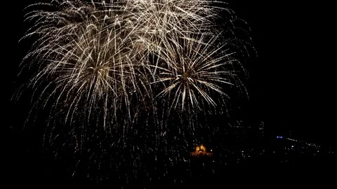 Amazing firework above the city in the night sky Stock Footage 84719808