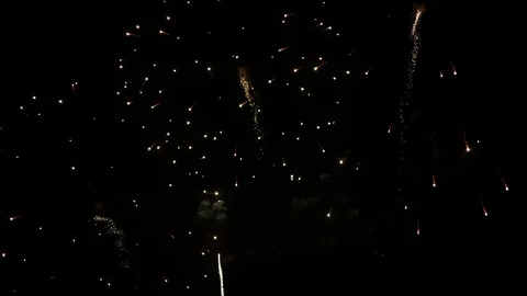 Amazing firework display exploding against dark sky Stock Footage 100520643