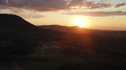 Amazing inspirational epic drone view of mountains during warm summer sunset Stock Footage 280378677