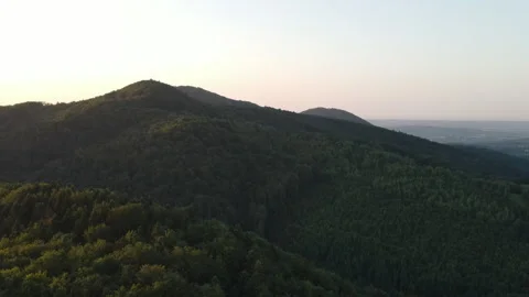 Amazing inspirational epic drone view of tops green woods in beautiful mountains Stock Footage 323705967
