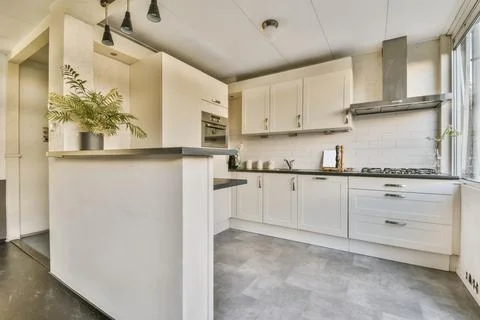 Amazing kitchen in light colors with a modern oven Stock Photos