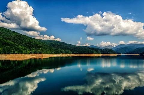 Amazing lake reflection with clouds Stock Photos