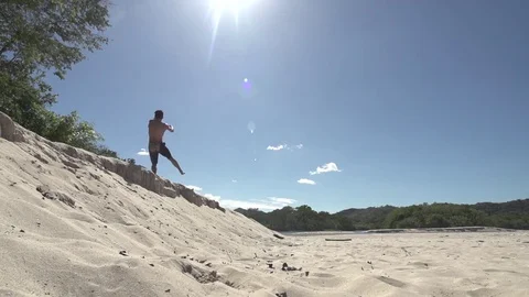 Amazing Layout Cork Parkor Flip at Tropical Beach Slow Motion  Stock Footage 85130467