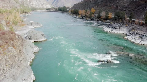 Amazing light blue mountain river with rapids Stock Footage 311308477