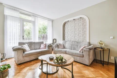 Amazing living room with gray sofas Stock Photos