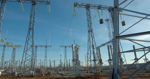 Amazing metal structures and high voltage power lines, construction site, 4k Stock Footage 133558637