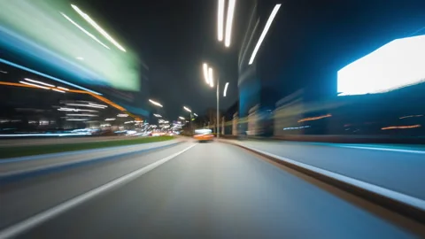 Amazing motion timelapse of the night rush drive in a big city Vidéo 143676055