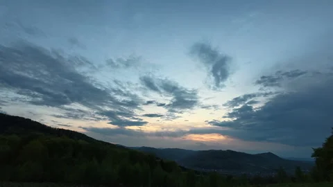 Amazing mountains and blue cloudy sky during beautiful sunset or sunrise Stock Footage 326890988