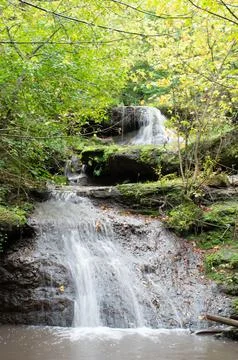 Amazing multi-level waterfall hidden in the forest Stock Photos