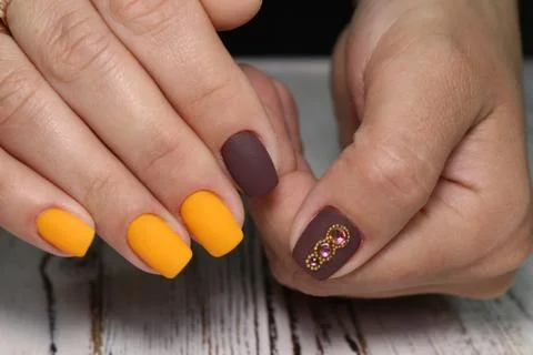 Amazing natural nails. Women's hands with clean manicure. Stock Photos