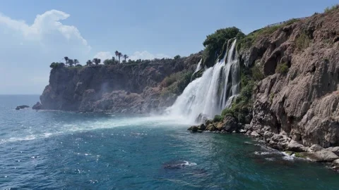 Amazing nature landscape view of Lower Düden Waterfall cascading into sea Stock Footage 342796577