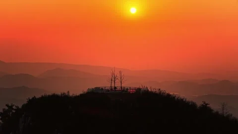 Amazing Orange Sunset Through Clouds Over China Mountains Stock Footage 326013515