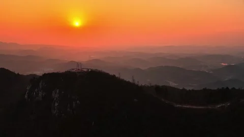 Amazing Orange Sunset Through Clouds Over China Mountains Stock-Footage 326014655