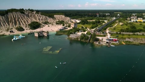 Amazing orbit video of sand dune formation next to unique lagoon in Rummu Stock Footage 224524329