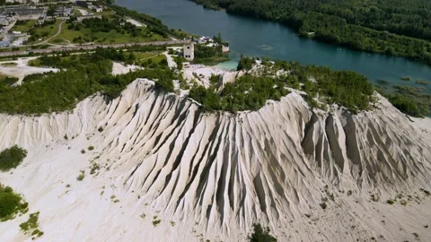 Amazing orbit video of sand dune formation next to unique lagoon. Stock Footage 224525622
