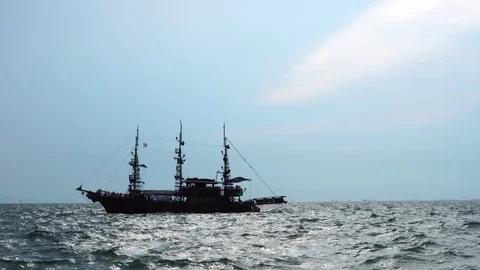 Amazing panoramic view on big old retro sail hip vessel sailing across cloudy Stock Footage 94971048