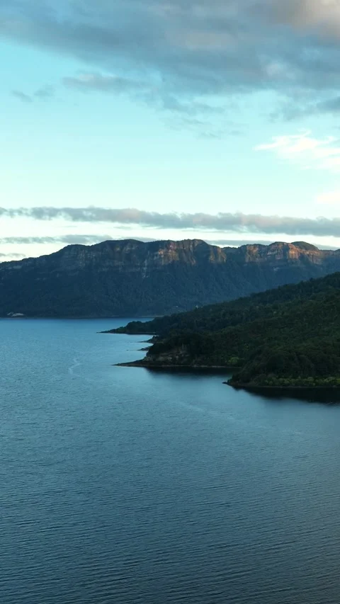 Amazing panoramic view of Lake in the middle of the forest surrounded by mo.. Stock Footage 284740689
