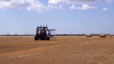 Amazing panoramic view on modern technology agricultural tractor machine driving Stock Footage 94875733
