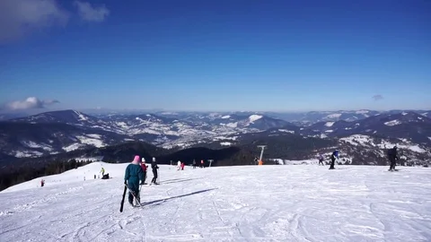 Amazing panoramic view of snow capped hill in the mountain woods on bright day Stock Footage 81550022
