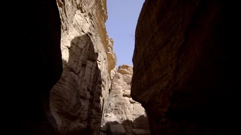 Amazing Path that passes between a canyon made up of red rocks in Petra Stock Footage 103521918
