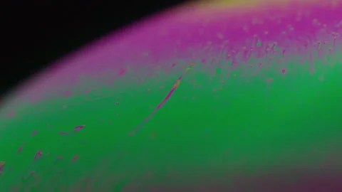 Amazing rainbow gradient background in motion. 4K. Fuel liqud. Stock Footage 159732223