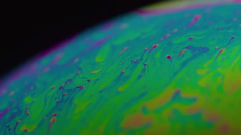 Amazing rainbow gradient background in motion. 4K. Fuel liqud. Stock Footage 159733217