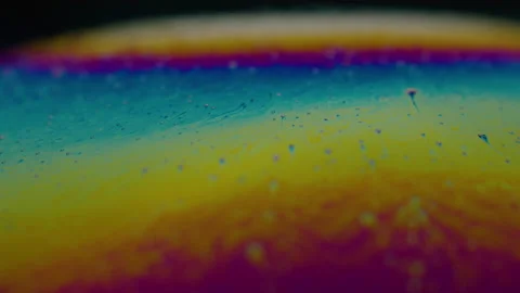 Amazing rainbow gradient background in motion. 4K. Fuel liqud. Stock Footage 159734251