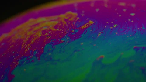 Amazing rainbow gradient background in motion. 4K. Fuel liqud. Stock Footage 159735703