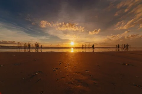Amazing reflection and clouds, timelapse of a sunset at a beach in Kuta, Bali, Stock Footage 100271387