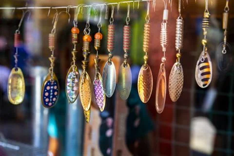 Amazing selective focus shot of different colorful fish hooks 写真素材