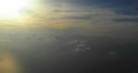 Amazing shot of fluffy clouds from an airplane window Stock Footage 238484902